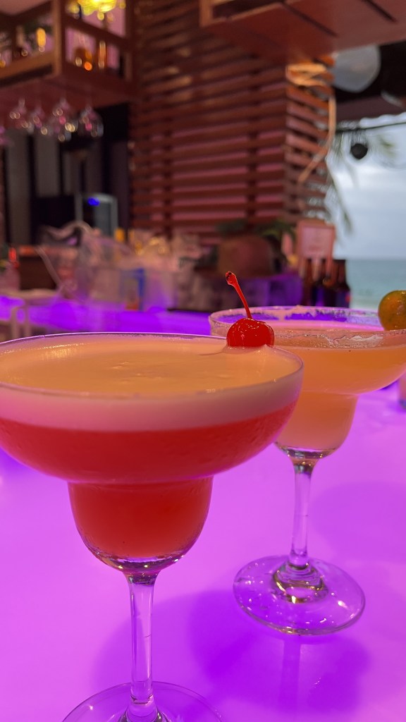 Two cocktails from the bar in the Boracay Ocean Club beach compound. The cocktail on the back is calamansi-flavored; while. the one in front is the secret recipe with taste notes of cherry and coconut.